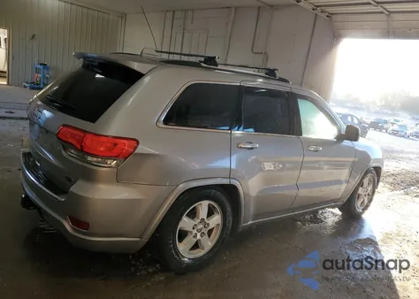 2014 Jeep Grand Cherokee Overland z USA, uszkodzony, nr VIN 1C4RJFCG4EC427235